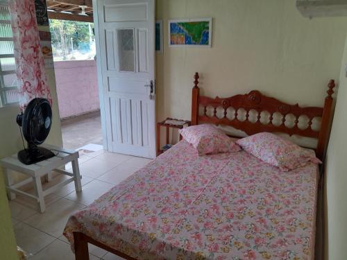 Praia da Enseada Apartment | Suíte externa com entrada independente