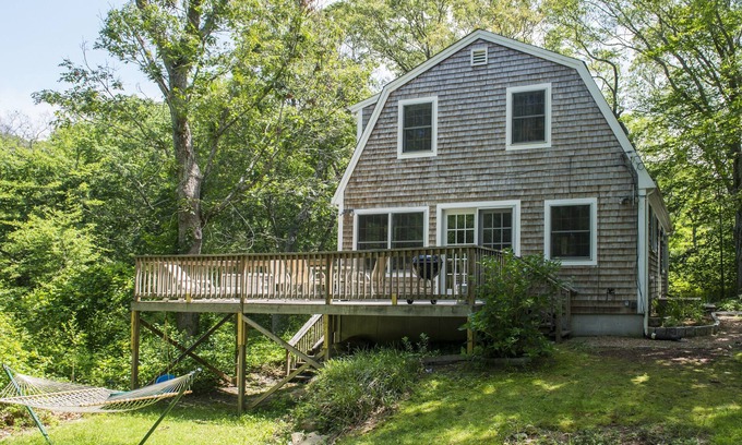 Vineyard Haven House | Sunny, secluded midcentury beach house short walk to Lambert's Cove-year round