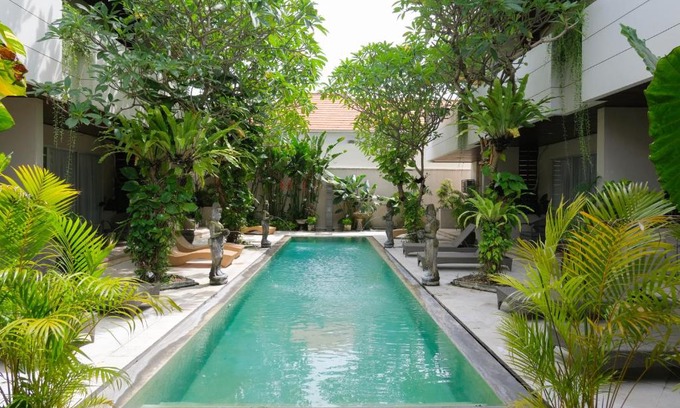 Sunset Road Apartment | Swiss-Belcourt Sunset