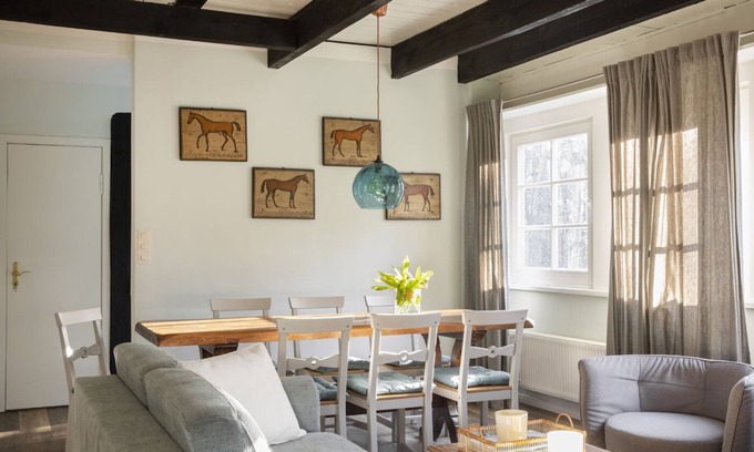 Manhagen Apartment | Thatched cottage with proximity to the Baltic Sea, outdoor sauna, playground and large garden
