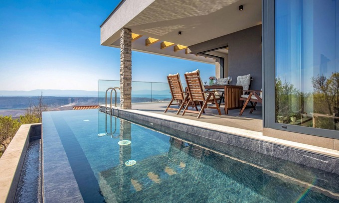 Smrika House | The attractive semi-detached house, which consists of two floors, is located on a hill far from the