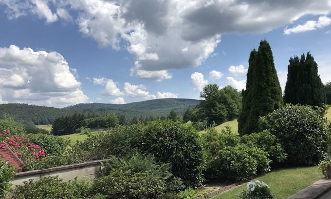 Hirschhorn House | "The Enchanted Cottage" is a chic private garden apartment with gorgeous views.