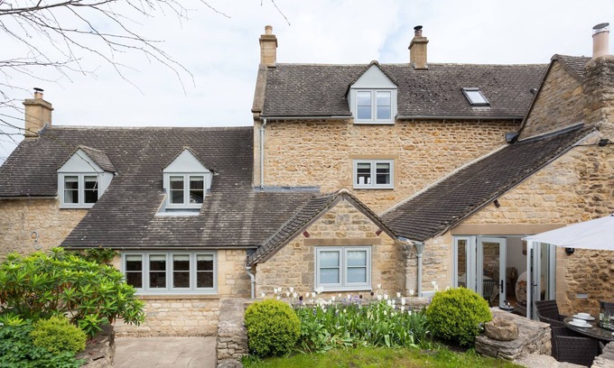 Guiting Power Cottage | The Nook boasts pretty views over the stunning Cotswolds rooftops in the village of Guiting Power