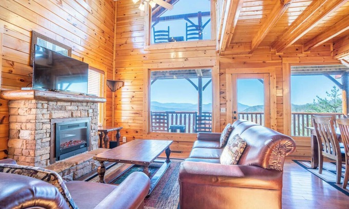 Sevierville Resort | This cozy one-bedroom cabin offers rest and relaxation for up to eight guests