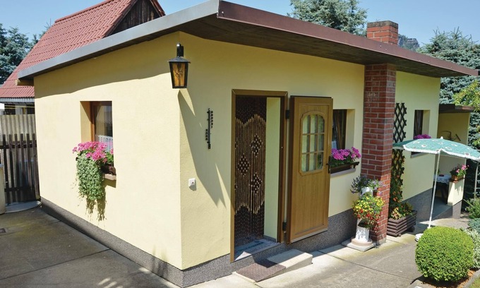 Konigstein an der Elbe House | This cozy vacation home in the garden of a family house in Königstein stands high above the river va