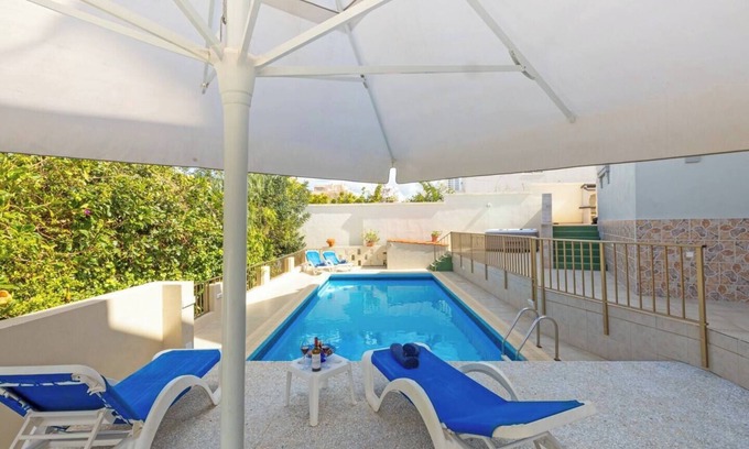 Santa Maria Estate House | This house is a 4 bedroom(s), 2 bathrooms, located in Il-Mellieħa, null.