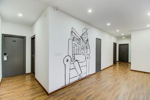 Gachibowli Hotel | Townhouse De Alphabet Hotel