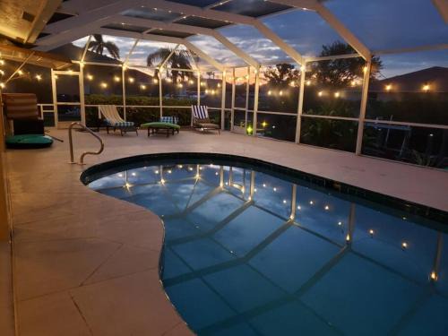 Cape Coral House | Tropical Breeze Canal Waterfront Home, Heated Pool