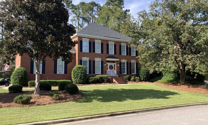 Martinez House | Updated and clean Masters rental in a gated, golf community