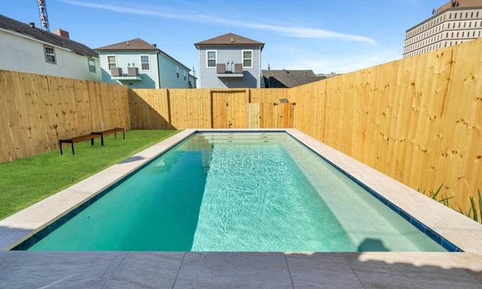 Tulane - Gravier Apartment | Urban Mid-City Getaway: Exclusive 4BR, 3BA, Balcony, Gated Pool, Parking