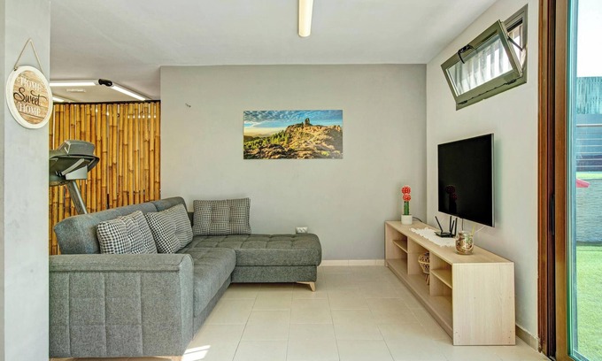 Las Palmas de Gran Canaria Apartment | Vacation Home "Harmony Level Floor" with Shared Pool, Garden & Wi-Fi