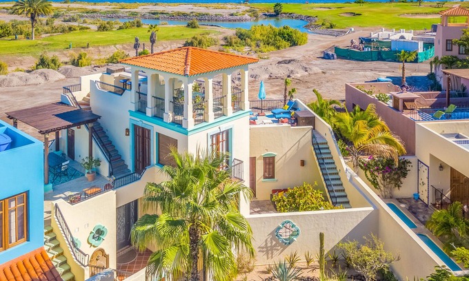 Nopolo House | Vibrant house with golf/ocean views, shared pool, partial AC, WiFi & gas grill!