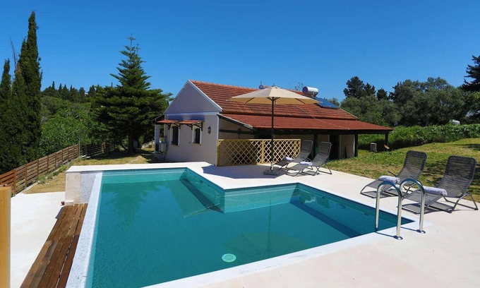 Arillas House | Villa Serenita is set in its own large grounds, enjoying lovely sea views, in a small traditional Co