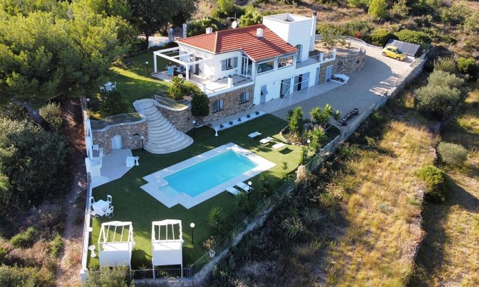 San Bartolomeo al Mare Villa | Villa surrounded by greenery with sea view and swimming pool