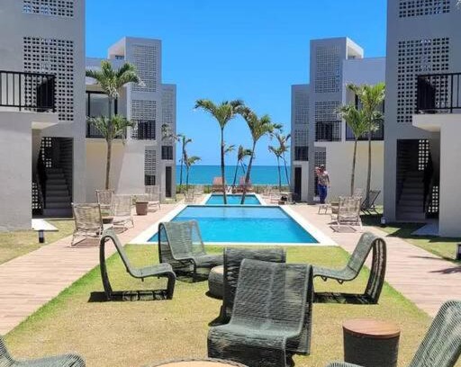 Itacimirim Apartment | Village 3 quartos frente mar em Itacimirim.