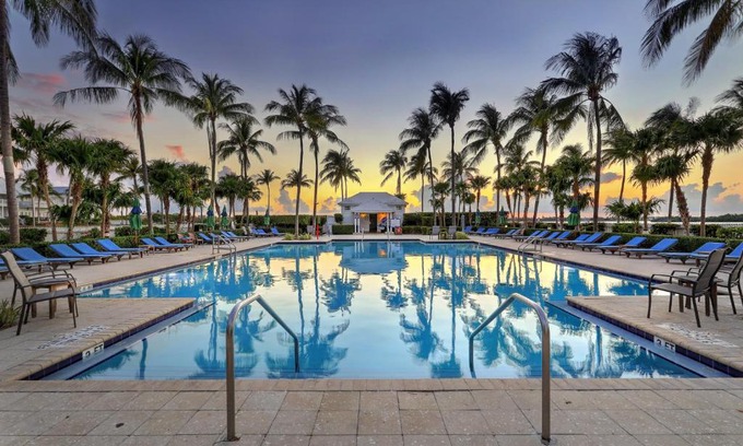 Coral Lagoon House | Waterfront luxury Villa 34 with sunset views and boat slip townhouse