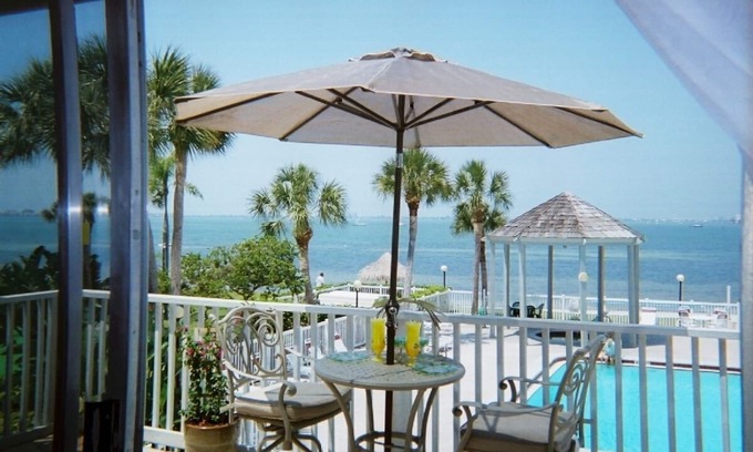 Bayview Condo | Waterfront, Private Beach, Dolphins. Flex dates.