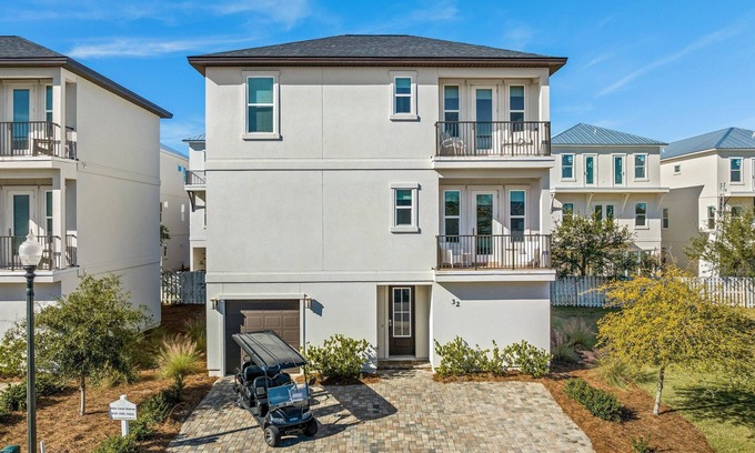 Miramar Beach House | White Coral Chateau with Low-Speed Vehicle, Heated Pool, and Cornhole Field