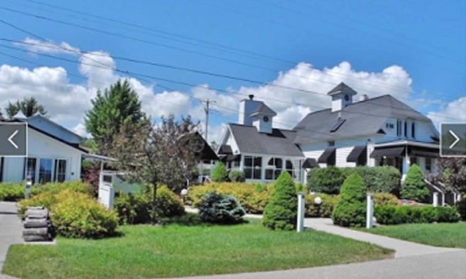 Suttons Bay House | White Fence-Exquisite Private Waterfront!