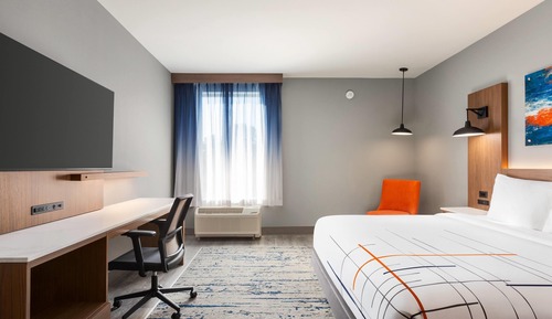 Suite, 1 King Bed, Hearing Accessible, Non Smoking (Roll-In Shower, Pet-Friendly)