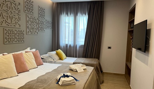 Deluxe Quadruple Room (106)