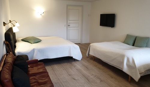 Deluxe Quadruple Room, Multiple Beds, Courtyard View