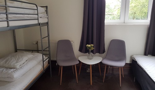 Triple Room - 1 Single Bed and 1 Bunk bed - Shared Bathroom