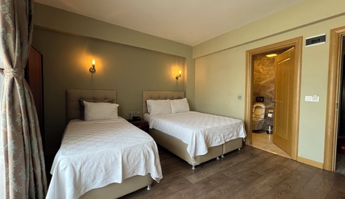 Deluxe Triple Room, Partial Sea View