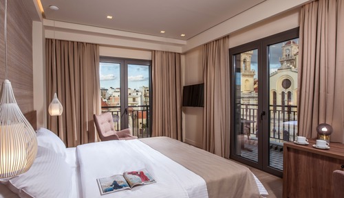 Deluxe Room with Balcony and City View