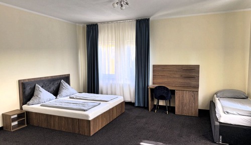 Deluxe Triple Room, Courtyard View