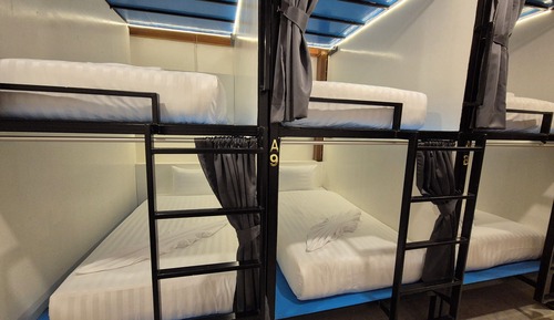 12 BUNK BEDS MALE SHARED DORMITORY