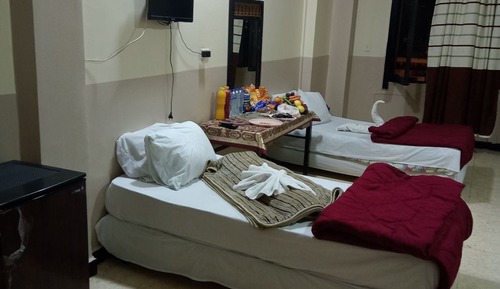 Deluxe Quadruple Room, Multiple Beds, City View