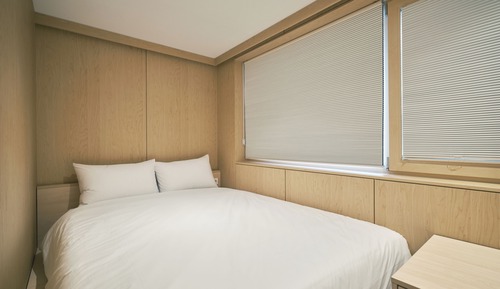 Deluxe Quadruple Room, 2 Queen Beds, Private Bathroom, Courtyard View