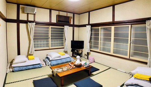 Japanese-Style Family Room with Shared Bathroom