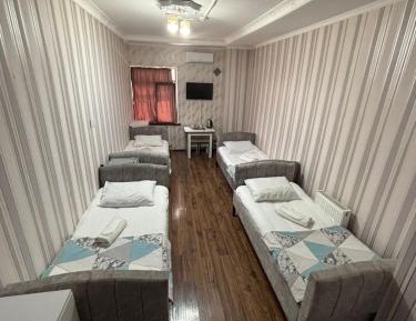 Quadruple Room with Private Bathroom