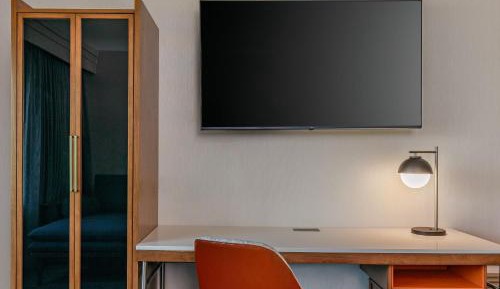 King Room with Sofa Bed and Roll-in Shower - Mobility and Hearing Accessible