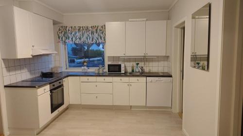 Three-Bedroom Apartment with Balcony