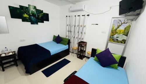 Deluxe Triple Room