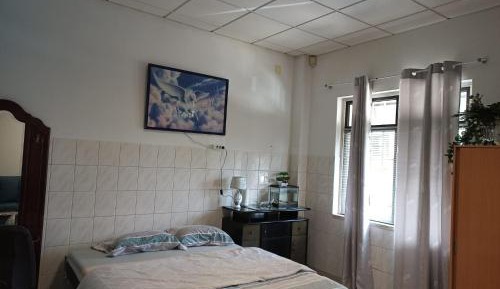 Standard Double Room with Shared Bathroom