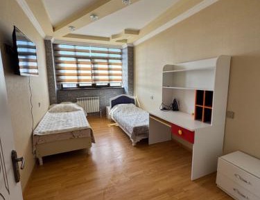 Three-Bedroom Apartment with Balcony