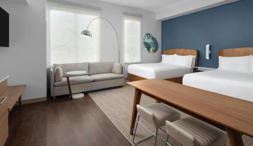 Queen Room with Two Queen Beds with Sofa Bed and River View