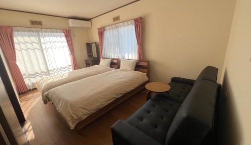 Triple Room with Shared Bathroom