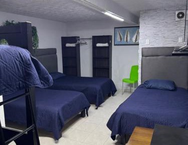 Quadruple Room with Shared Bathroom