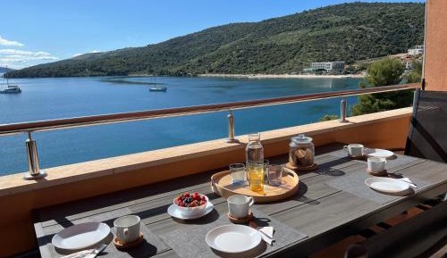 Three-Bedroom Apartment with Sea View