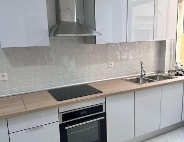 Three-Bedroom Apartment with Balcony