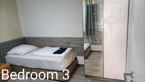 Three-Bedroom Apartment with Balcony