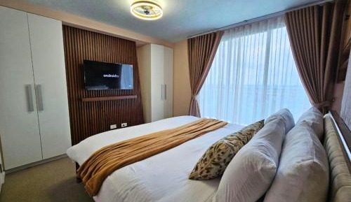 One-Bedroom Apartment with Balcony and Sea View