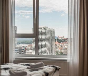 One-Bedroom Apartment with Balcony and City View