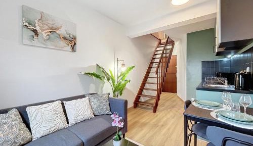 One-Bedroom Apartment with Balcony and City View
