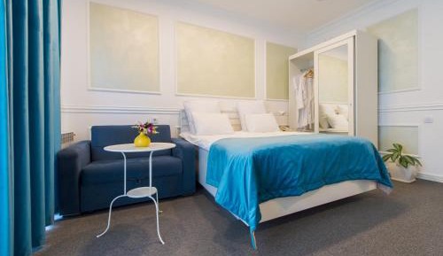 Deluxe Double Room with Balcony and Side View of the Sea